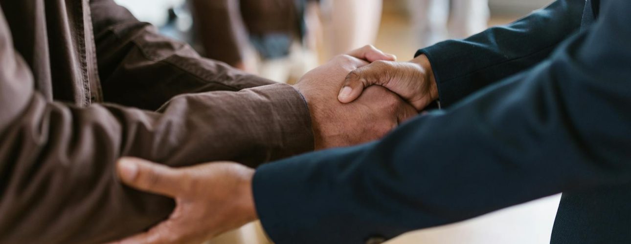 Hands or workspace suggesting field work or estimates, used as the featured image for contractor leads and SEO in Asheville.
