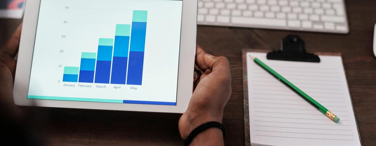 People in a business meeting, used as the featured image for a post about how much SEO costs in Asheville.